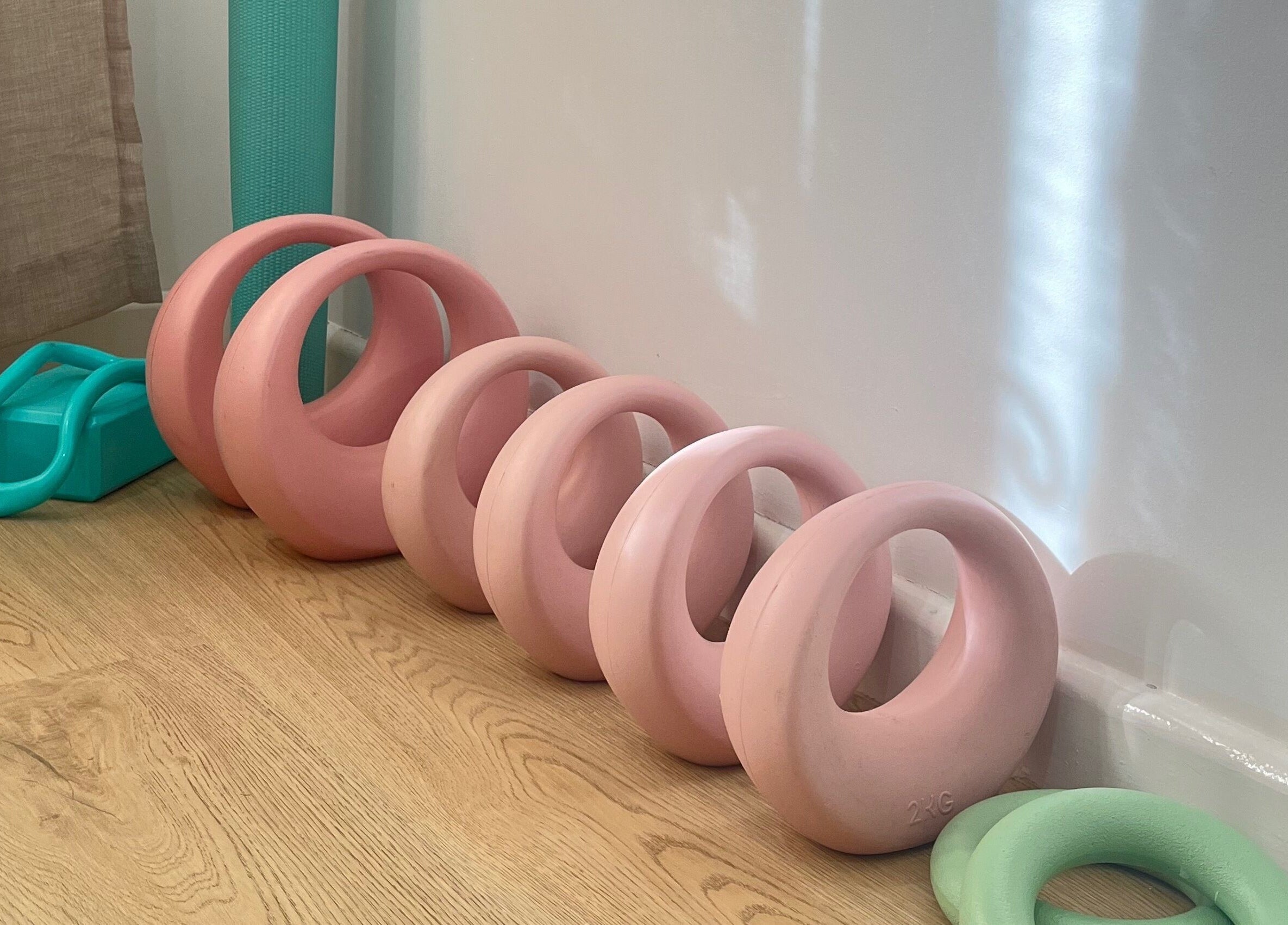 Pink and green exercise rings at RTC Wendouree Branch, Wendouree, Victoria, AU enhancing wellness ambiance.