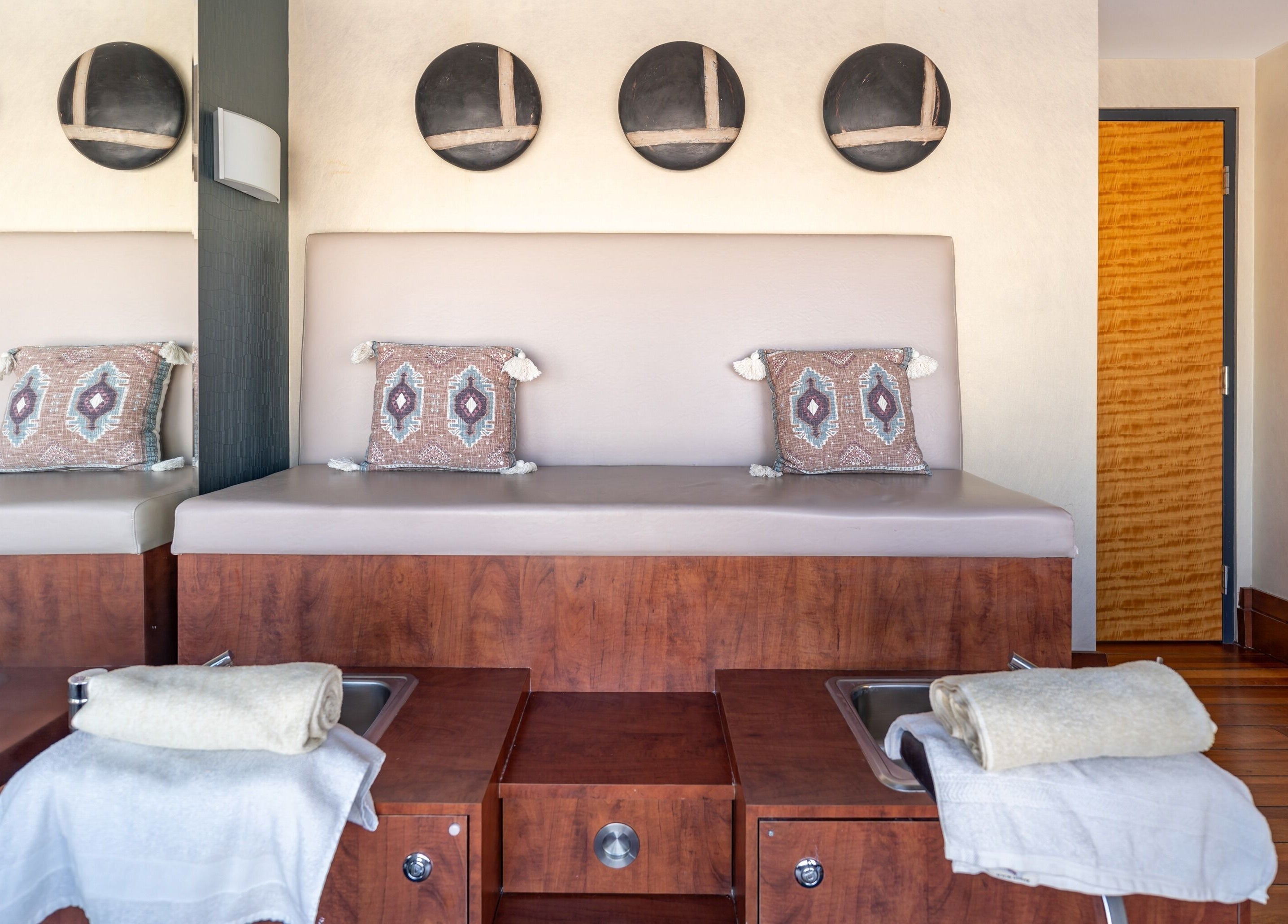 Cozy pedicure stations at Altispa - Montreal Airport - Marriott, Dorval, Québec, CA offer a serene retreat.