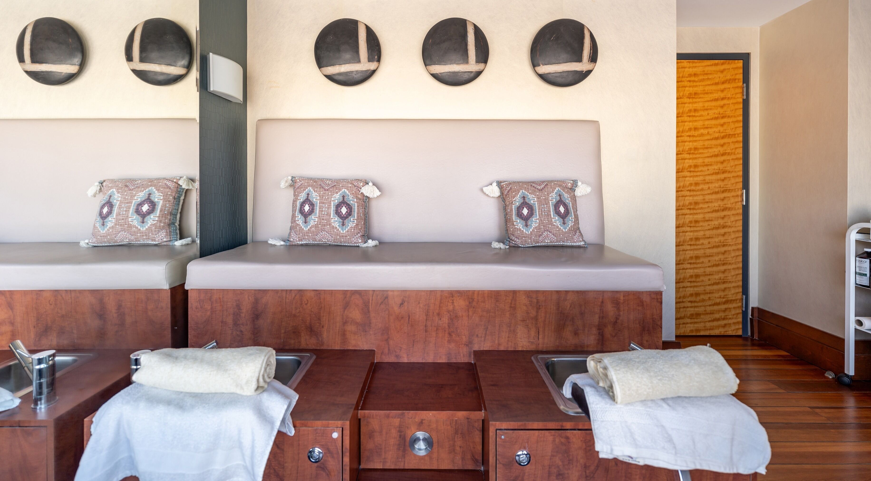 Cozy pedicure stations at Altispa - Montreal Airport - Marriott, Dorval, Québec, CA offer a serene retreat.