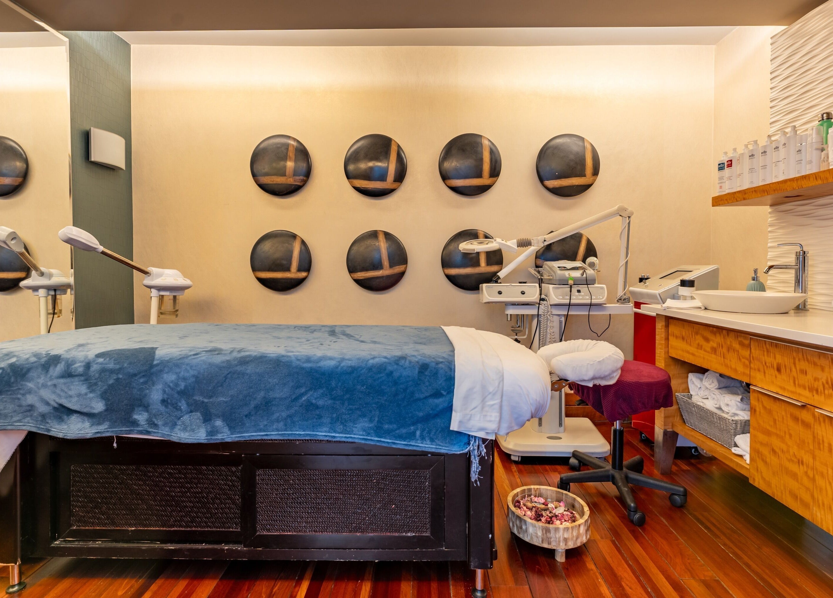 Relaxing spa room at Altispa - Montreal Airport - Marriott, Dorval, Québec, CA with soothing decor and modern equipment.
