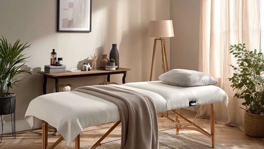 Relaxing massage room at Natalie’s Mobile Massage, Yarrabilba, Queensland, AU, featuring a cozy massage table.