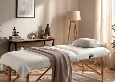 Relaxing massage room at Natalie’s Mobile Massage, Yarrabilba, Queensland, AU, featuring a cozy massage table.
