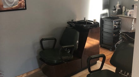 Modern salon chair and station at Elite Cuts Barber Salon, Chippewa Falls, Wisconsin, US.