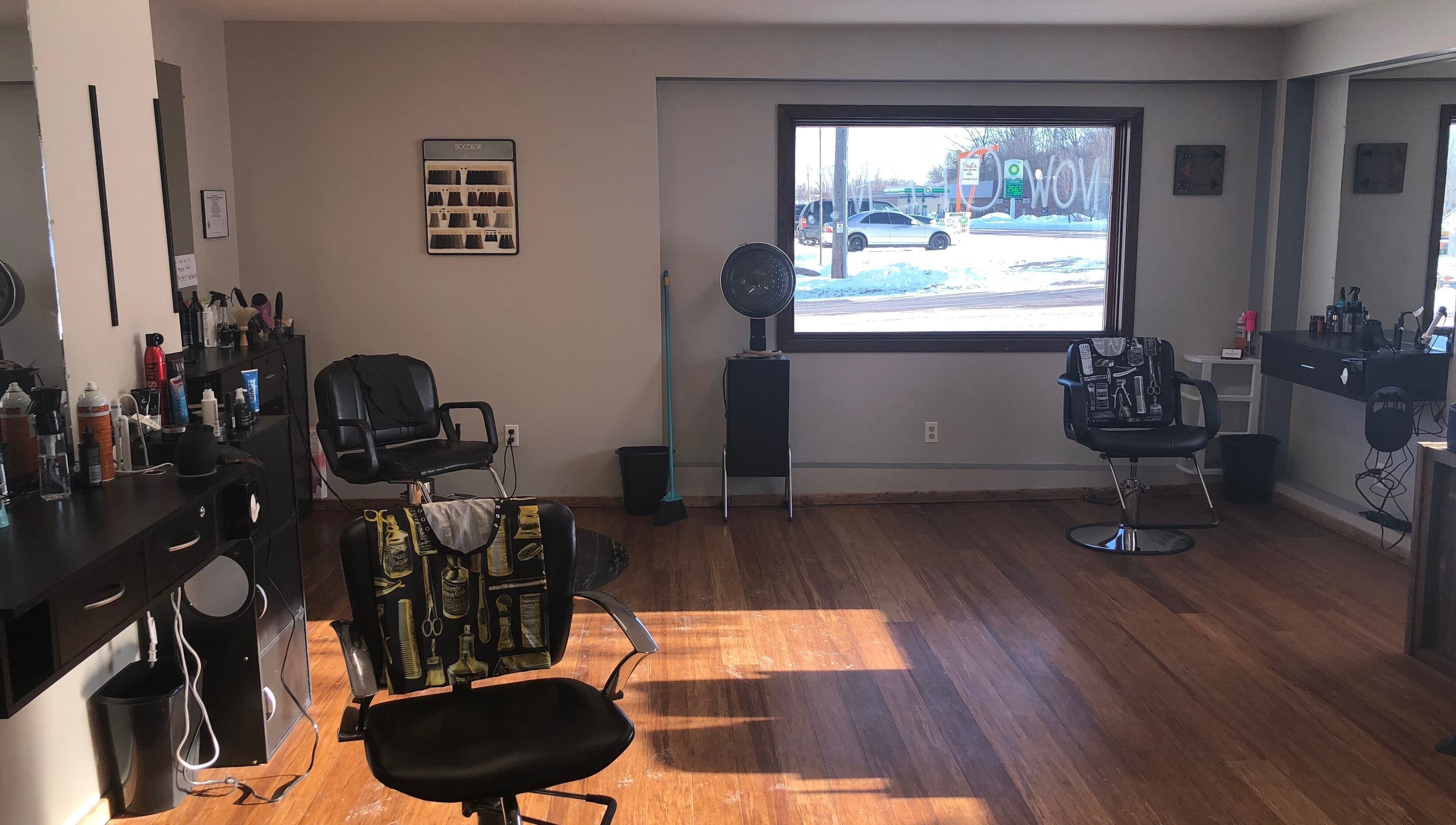 Interior of Elite Cuts Barber Salon in Chippewa Falls, Wisconsin, US, featuring stylish chairs and grooming stations.