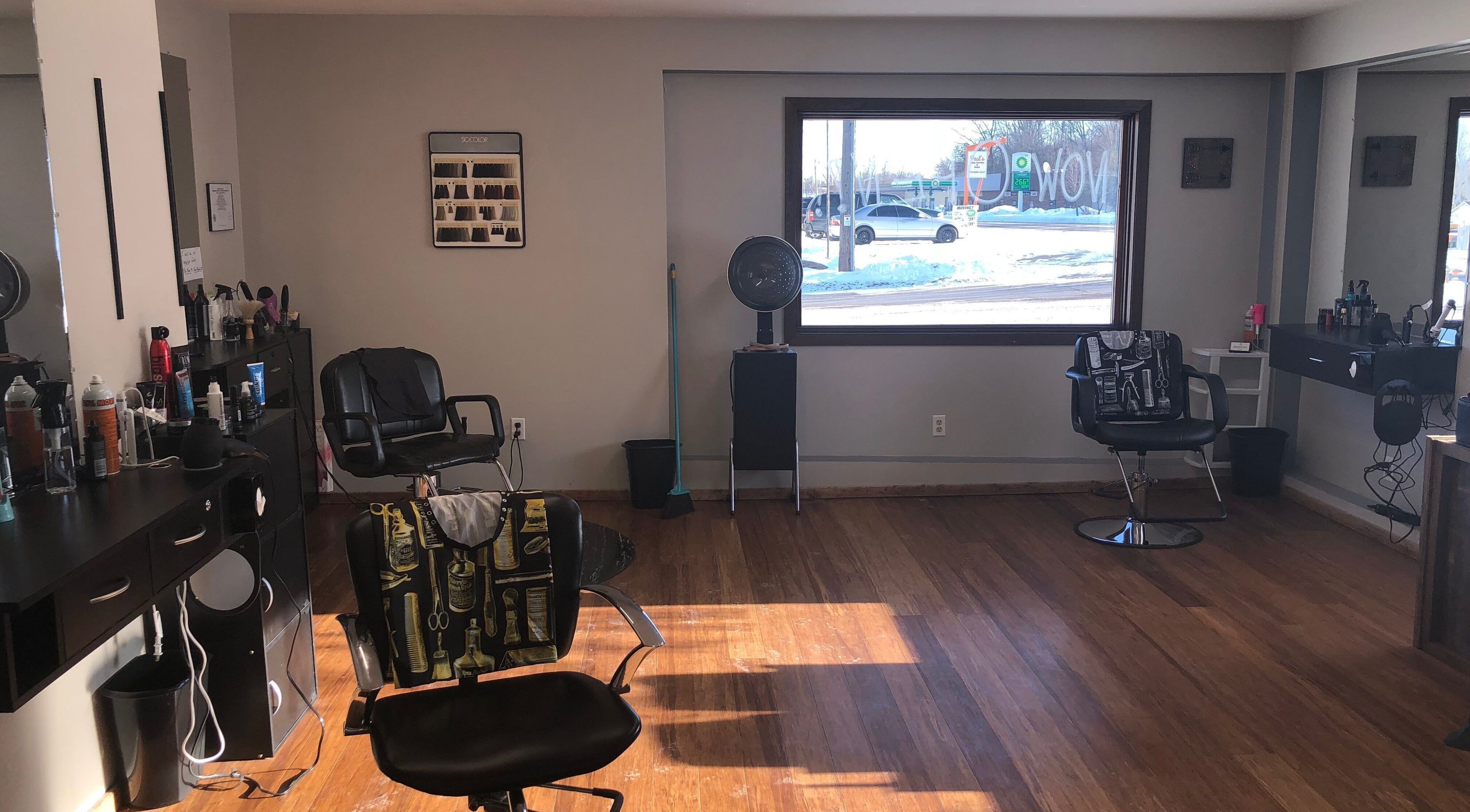 Interior of Elite Cuts Barber Salon in Chippewa Falls, Wisconsin, US, featuring stylish chairs and grooming stations.