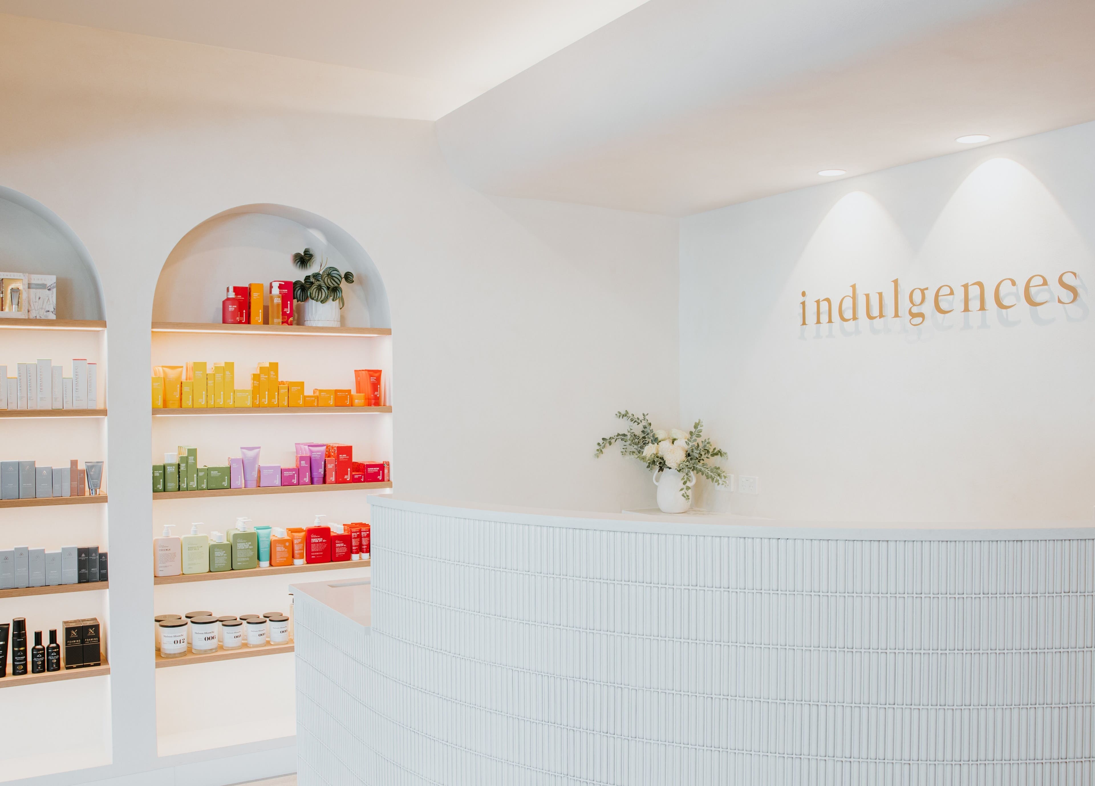 Colorful product shelves at Indulgences, The Junction, New South Wales, AU offering a serene experience.