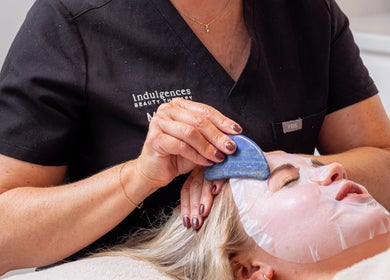 Facial treatment at Indulgences, The Junction, New South Wales, AU highlighting a calming beauty therapy.