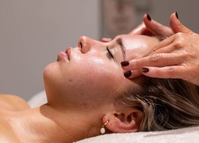 Relaxing facial massage at Indulgences, The Junction, New South Wales, AU. Experience tranquility and rejuvenation.