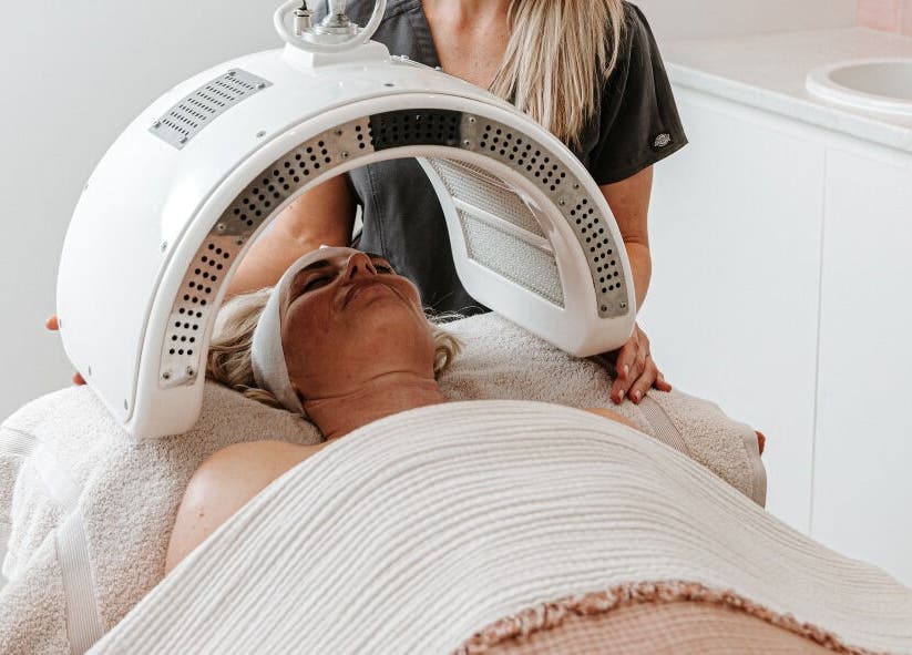 Client receiving LED therapy at Indulgences, The Junction, New South Wales, AU for skin rejuvenation.