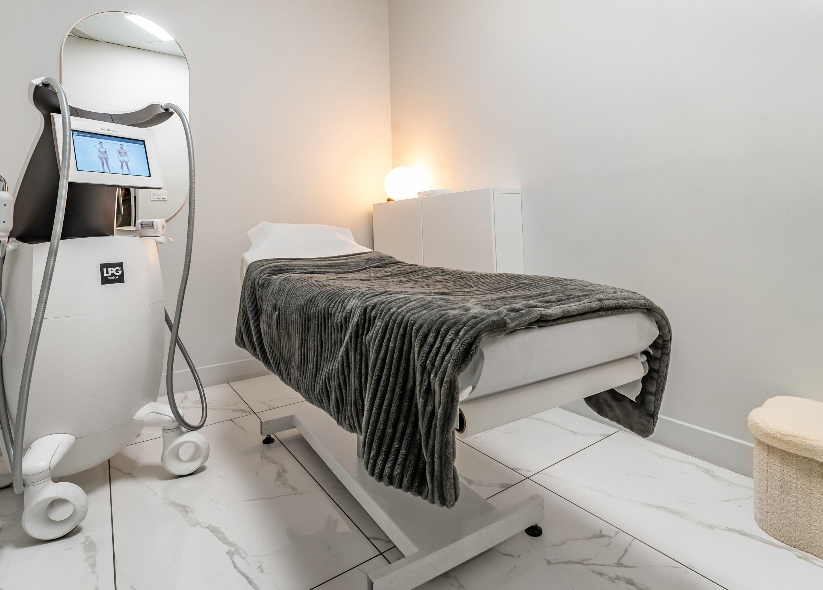 Treatment room at Cosmo with modern equipment in Montréal, Québec, CA for wellness therapies.
