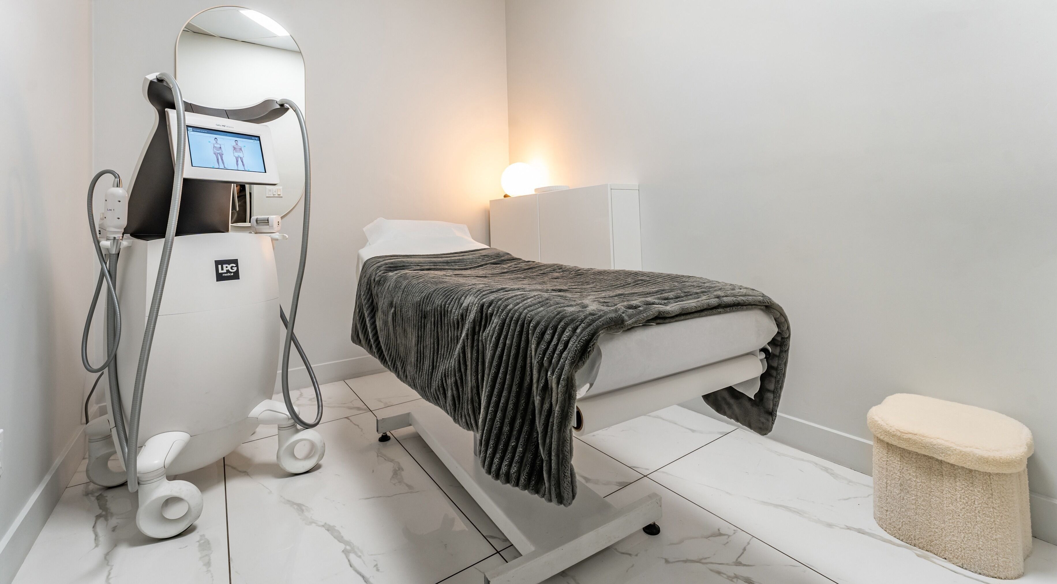 Treatment room at Cosmo with modern equipment in Montréal, Québec, CA for wellness therapies.