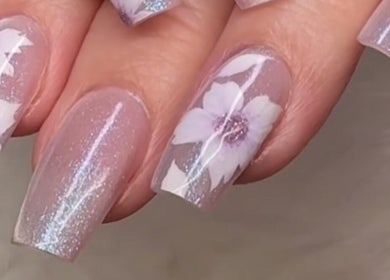 Elegant floral nails by Eye Candy Esthetics By Shanai in Oshawa, Ontario, CA, showcasing delicate flower designs.