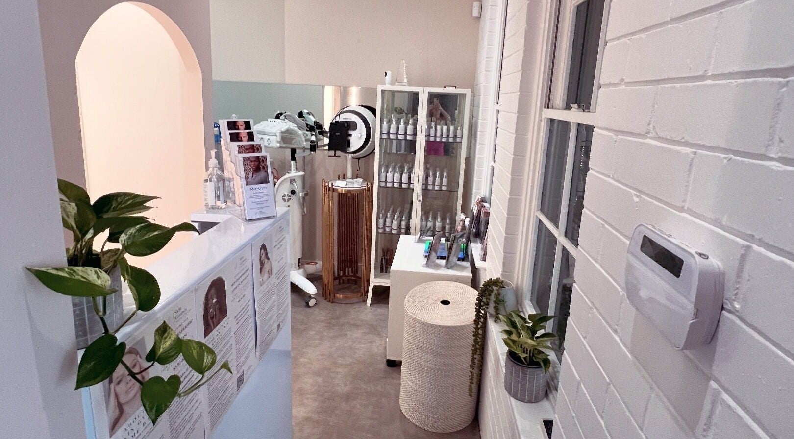 Calm treatment room at The Skin Genesis Collective, Nedlands, Western Australia, AU with skincare products.