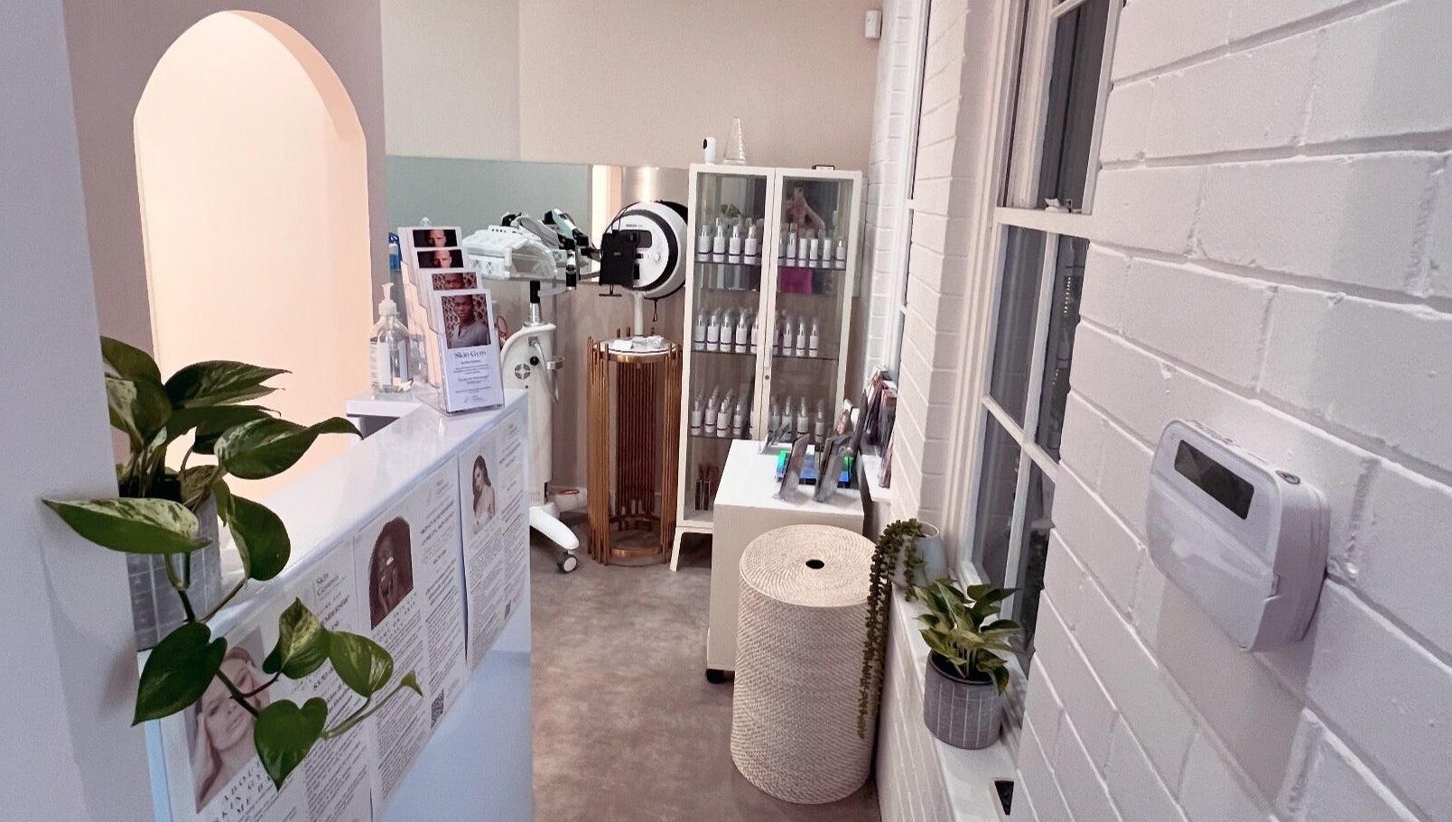 Cozy corner at The Skin Genesis Collective, Nedlands, Western Australia, featuring skincare products and decor.