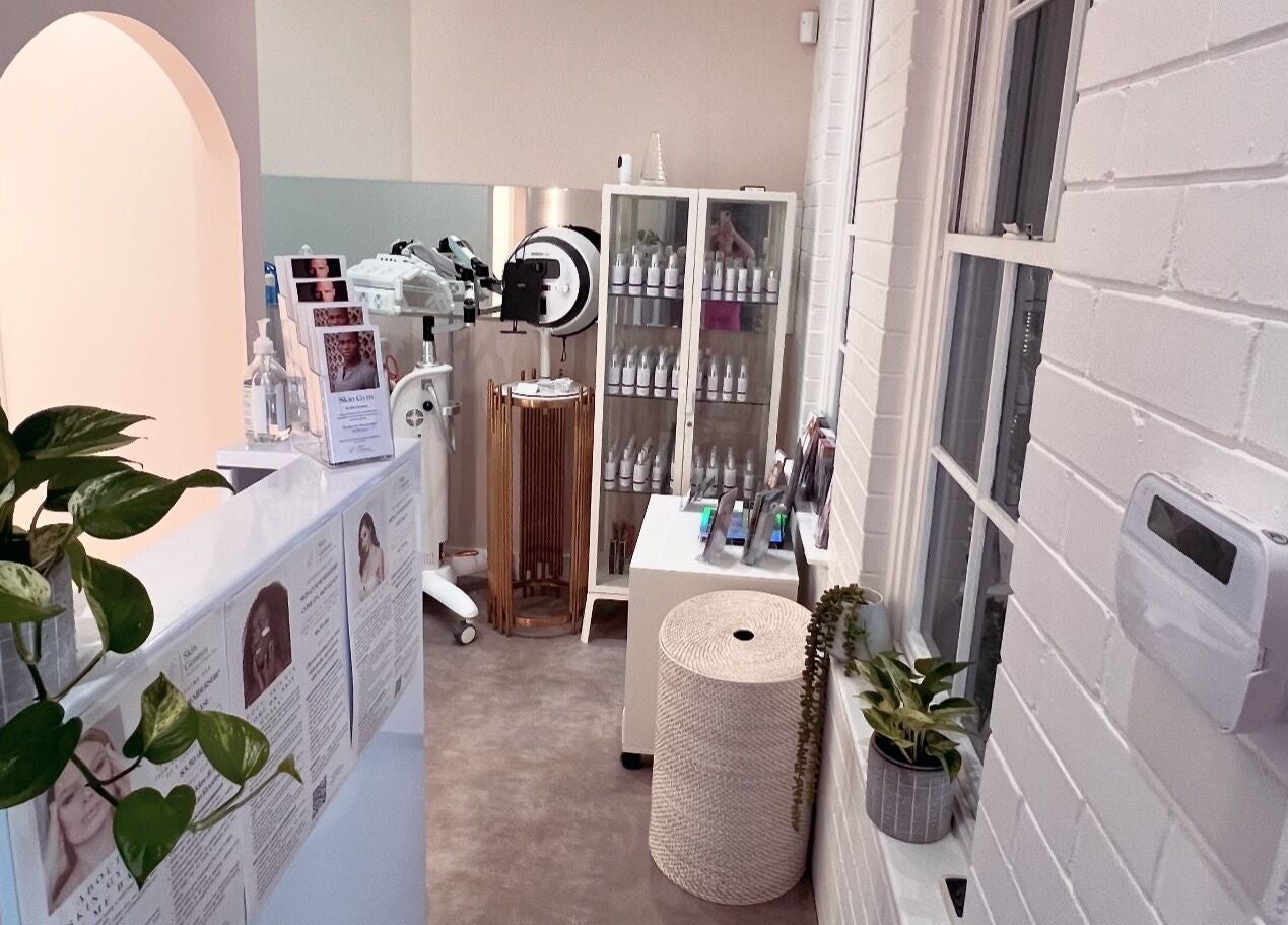 Cozy corner at The Skin Genesis Collective, Nedlands, Western Australia, featuring skincare products and decor.