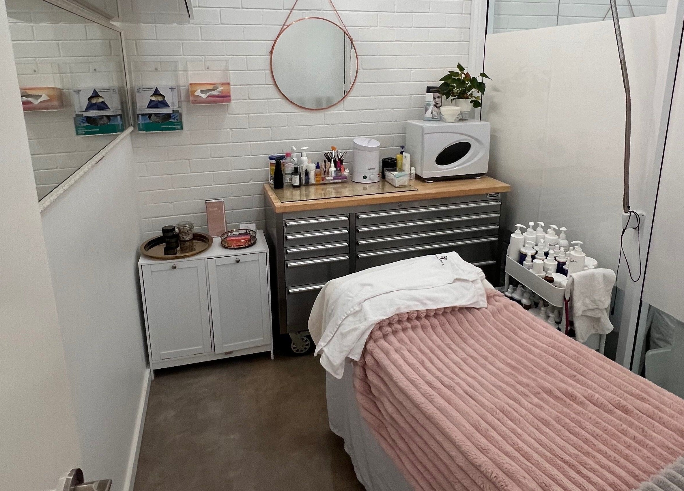 Cozy treatment room at The Skin Genesis Collective, Nedlands, Western Australia, AU. Inviting space for wellness.
