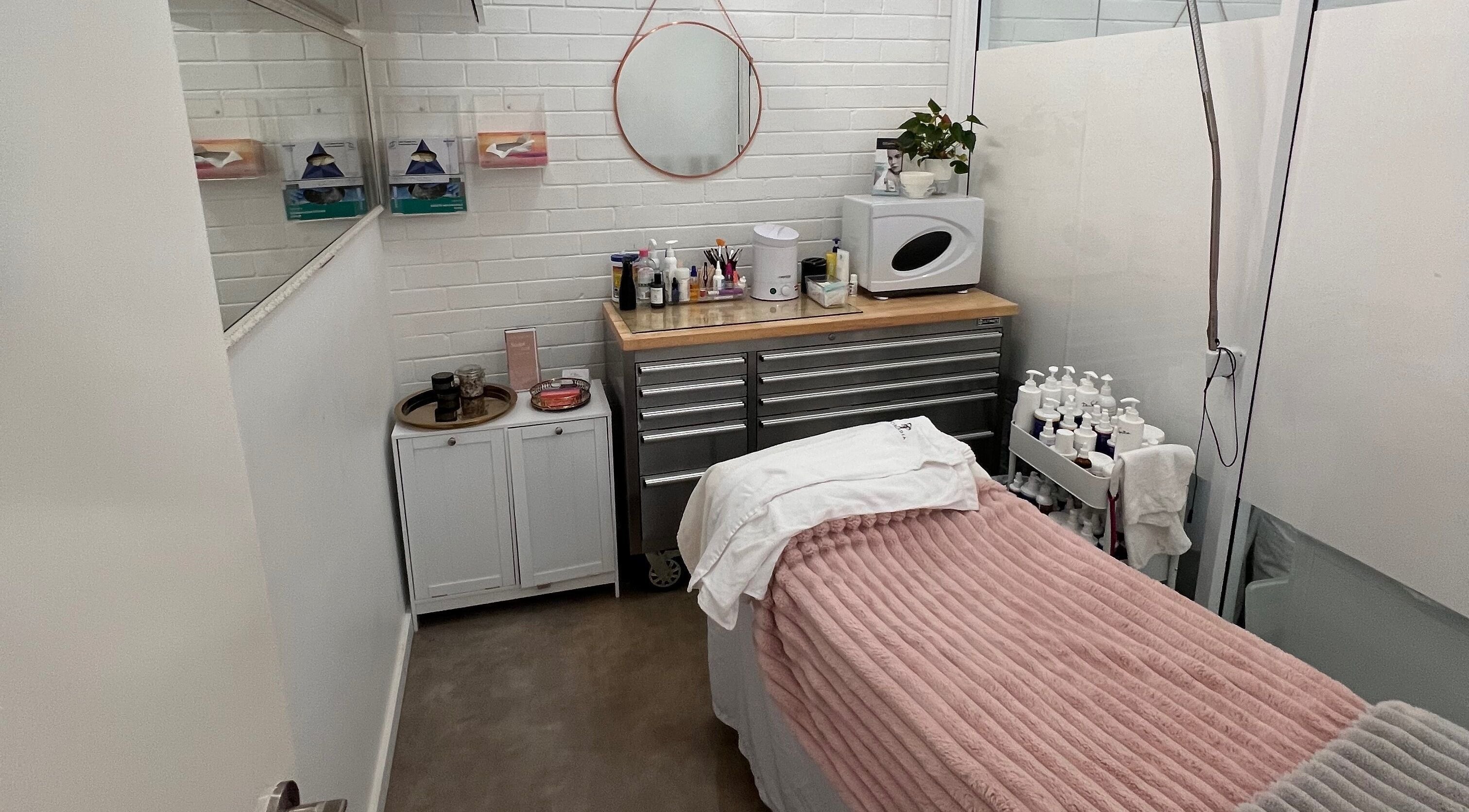 Cozy treatment room at The Skin Genesis Collective, Nedlands, Western Australia, AU. Inviting space for wellness.