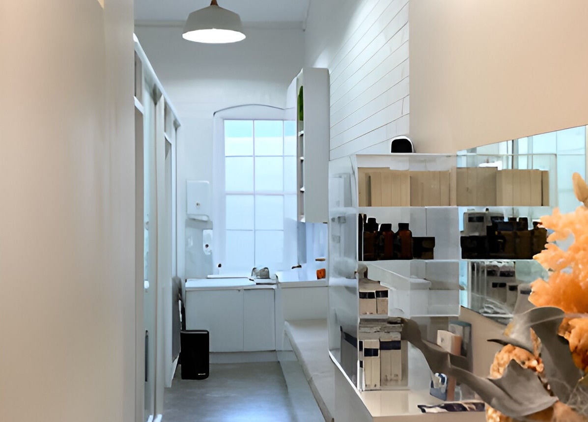 Modern treatment room at The Skin Genesis Collective, Nedlands, Western Australia, AU, with elegant decor.