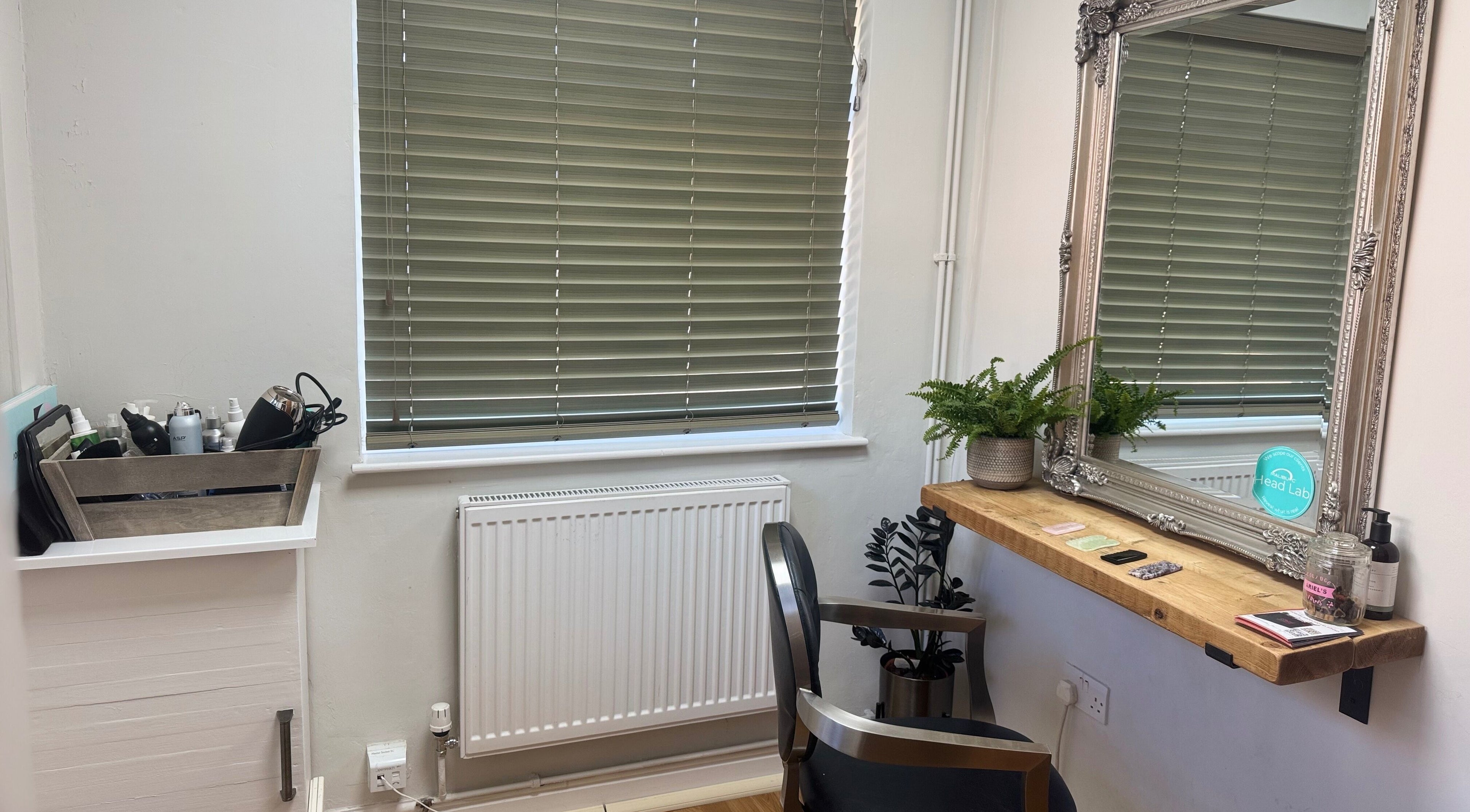 Cozy styling station at Gemma B Holistic Hairdressing in Dunstable, England, GB with elegant decor.