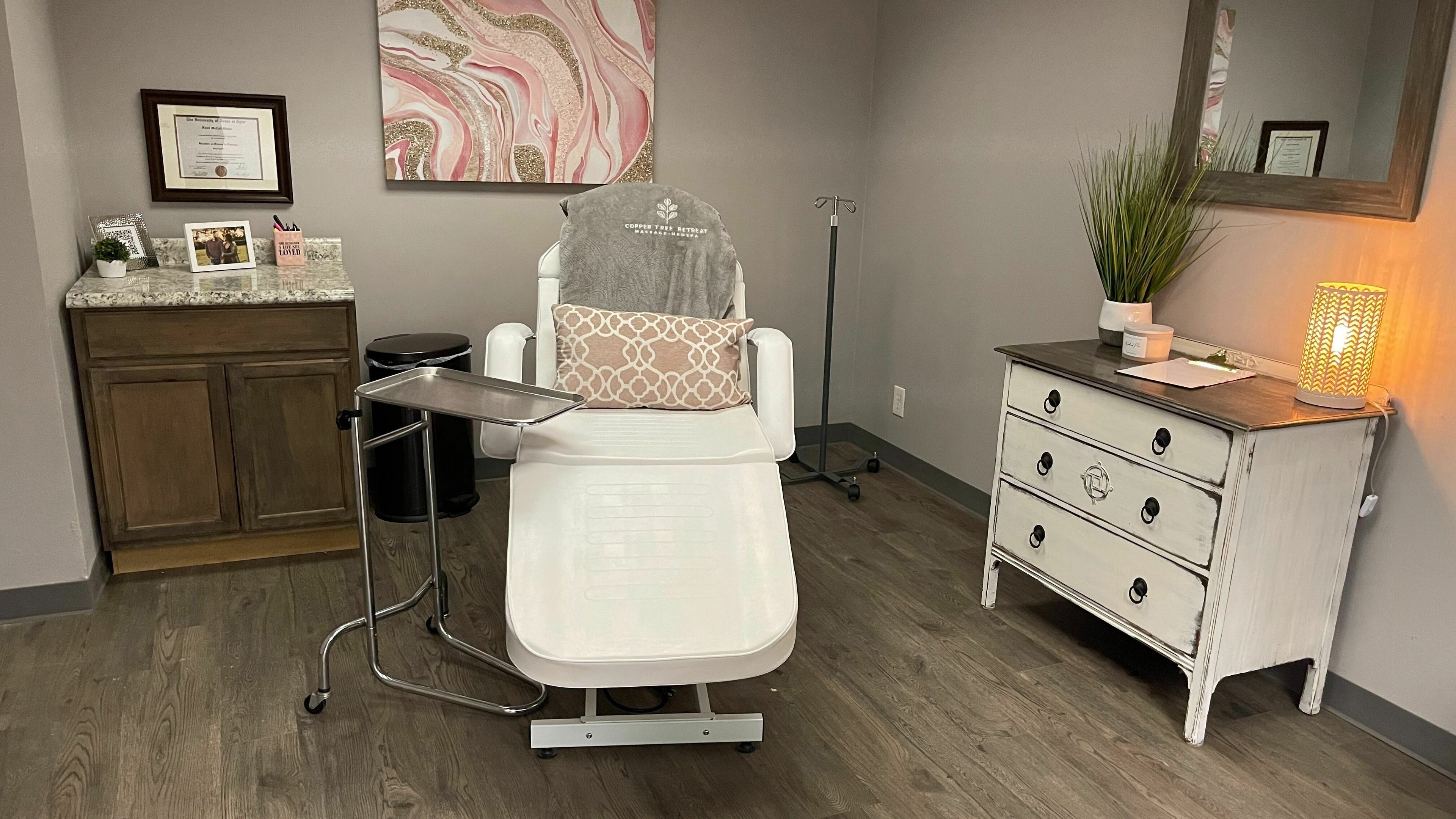 Inviting massage room at Copper Tree Retreat School of Massage, Longview, Texas, US, with cozy decor.