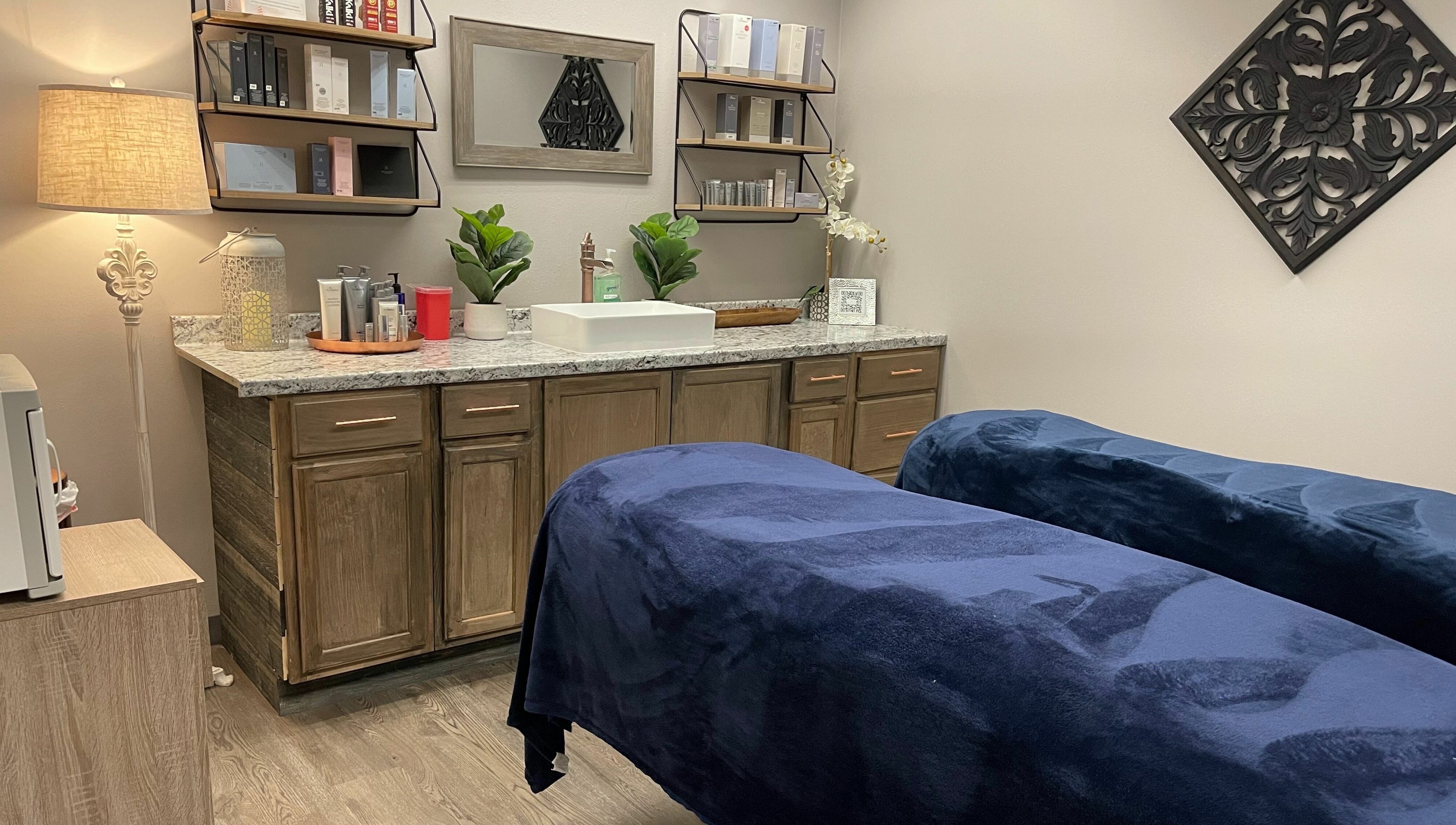 Relaxing treatment room at Copper Tree Retreat, Longview, Texas, US with cozy beds and luxury decor.