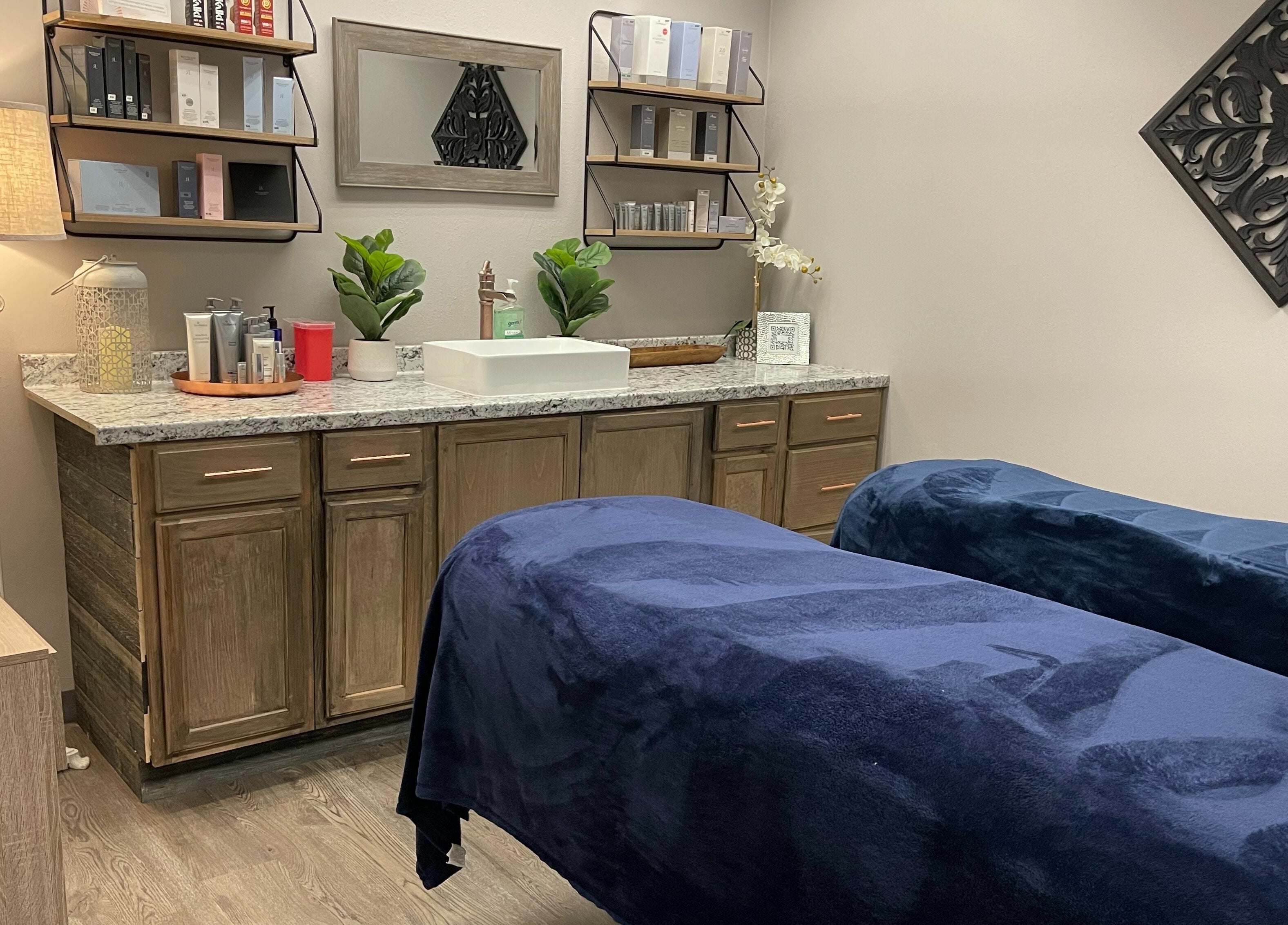 Relaxing treatment room at Copper Tree Retreat, Longview, Texas, US with cozy beds and luxury decor.
