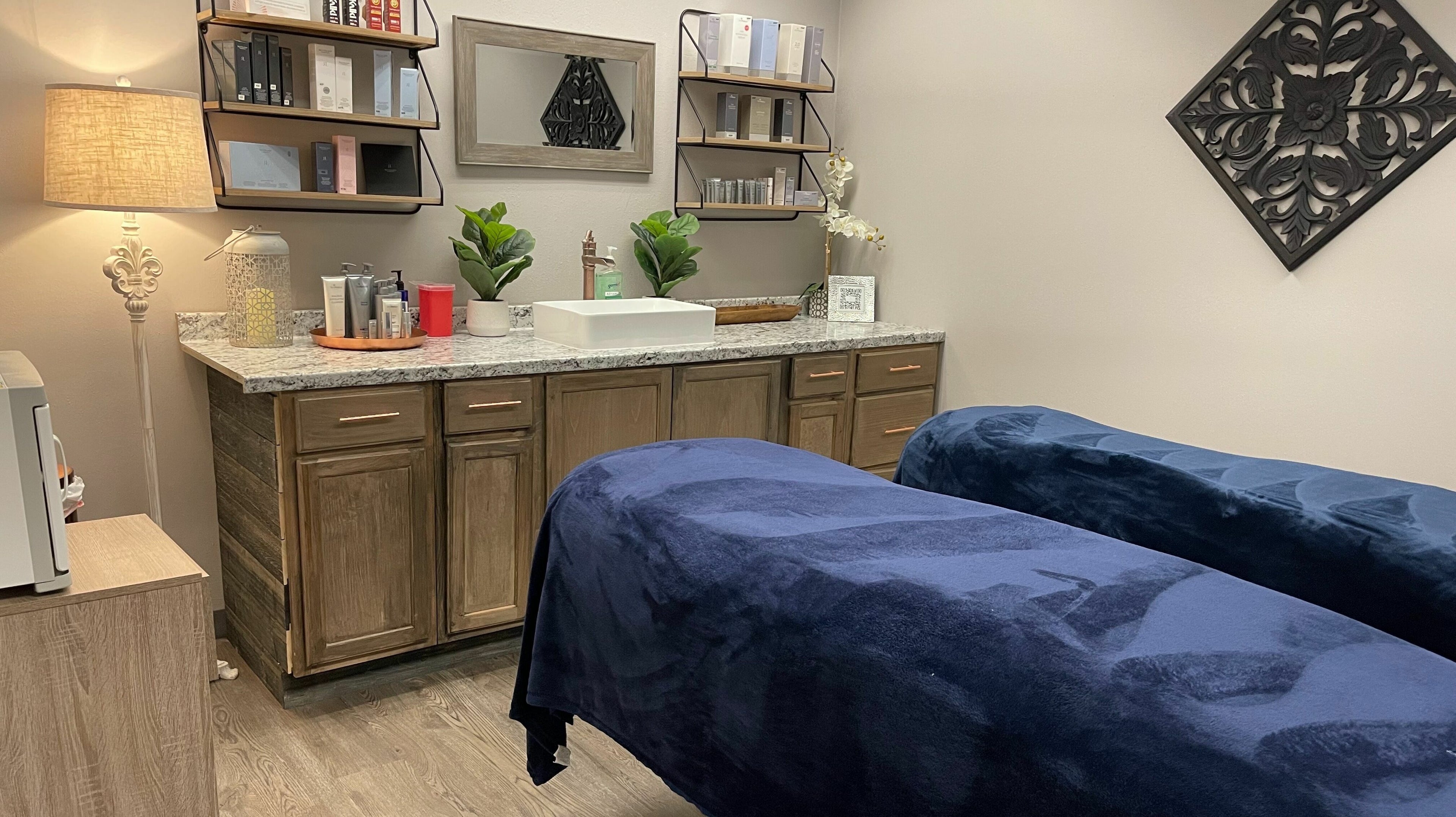 Relaxing treatment room at Copper Tree Retreat, Longview, Texas, US with cozy beds and luxury decor.
