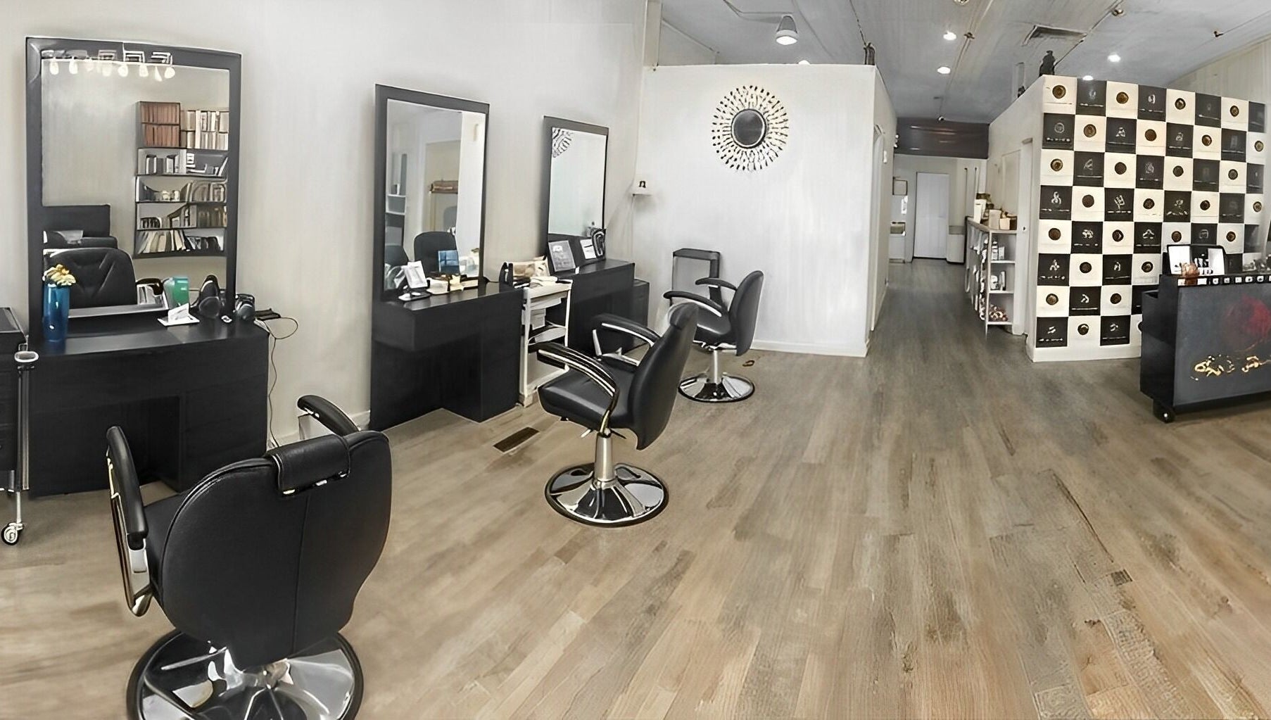 Chic interior of Pari's Hair and Beauty Salon in Hamilton, Waikato, NZ, featuring stylish chairs and decor.