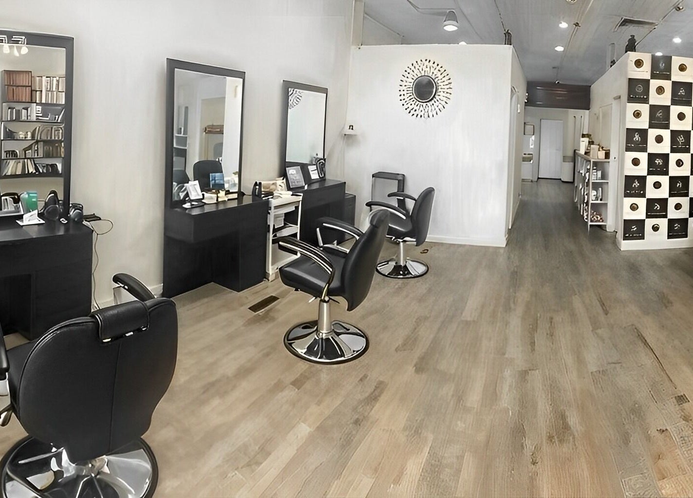 Chic interior of Pari's Hair and Beauty Salon in Hamilton, Waikato, NZ, featuring stylish chairs and decor.