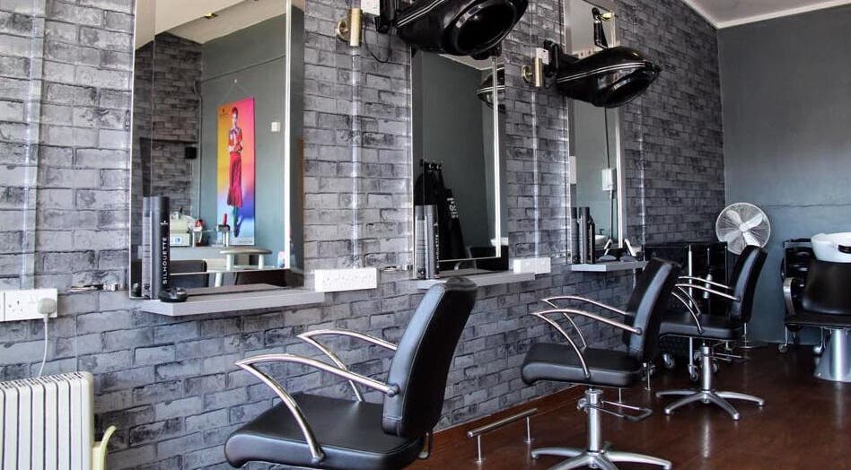 Modern salon chairs at Edwins Hair and Skincare Centre, Belfast, Northern Ireland, GB, ready for clients.