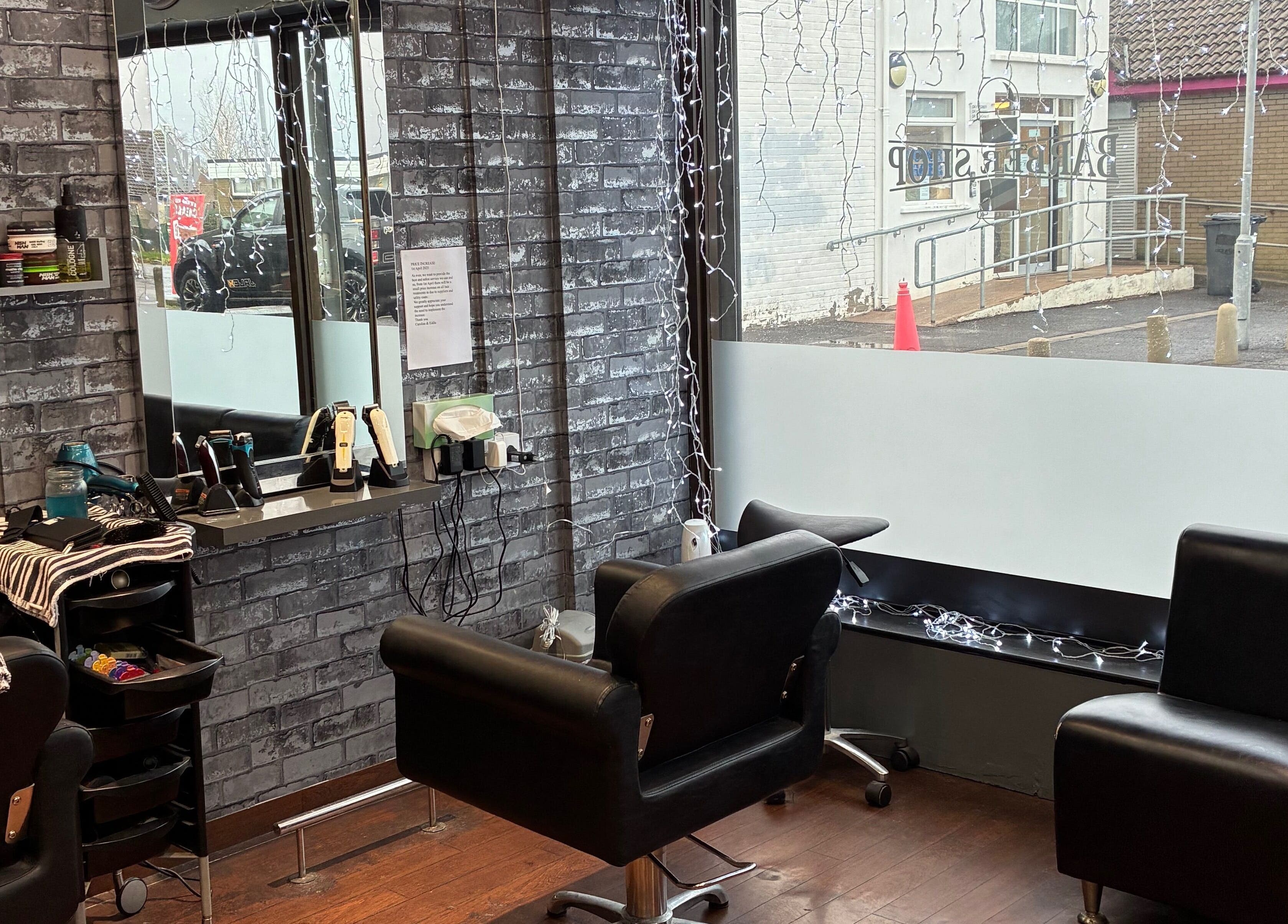 Chic interior of Edwins Hair and Skincare Centre in Belfast, Northern Ireland, GB, showcasing a modern salon setup.