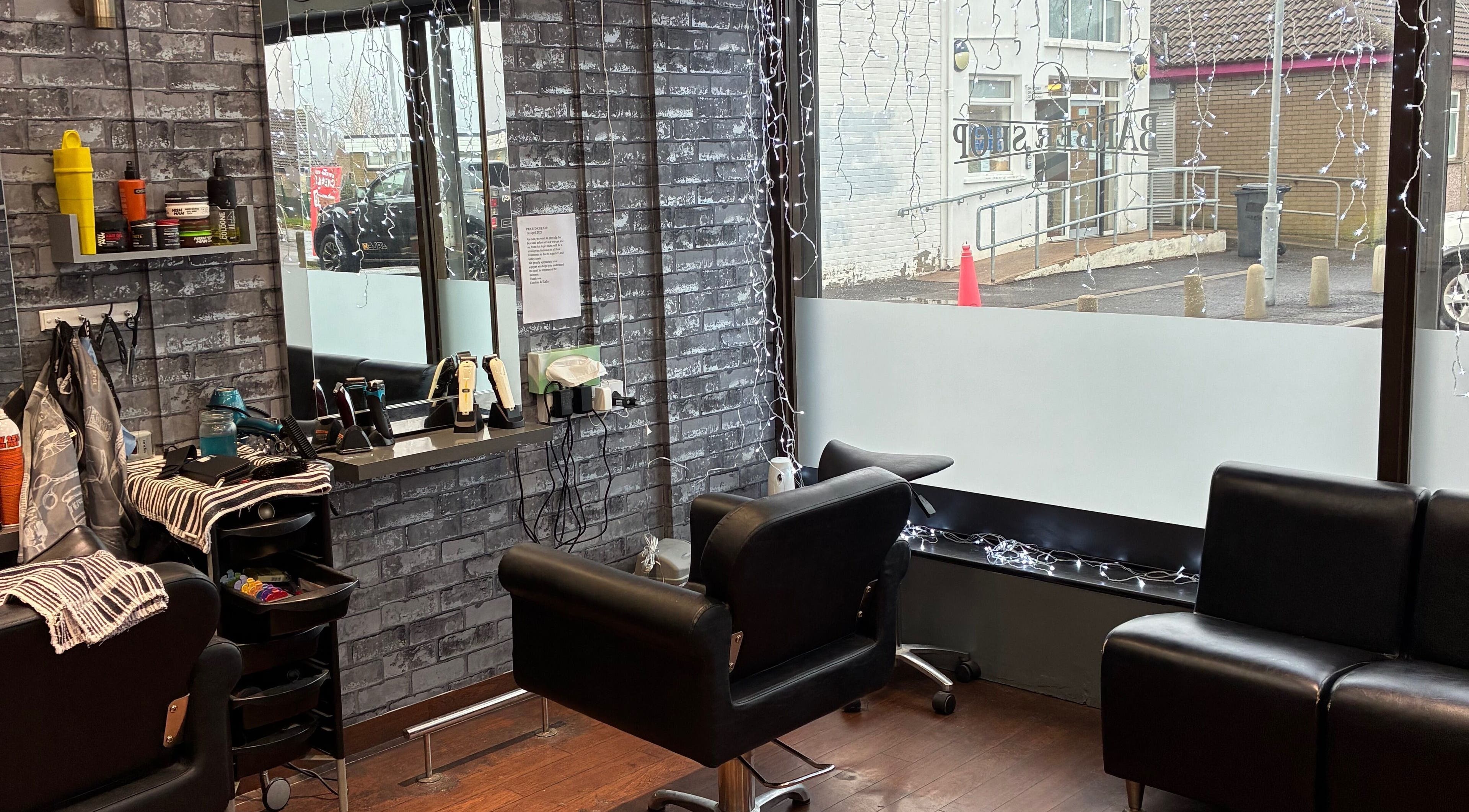 Chic interior of Edwins Hair and Skincare Centre in Belfast, Northern Ireland, GB, showcasing a modern salon setup.