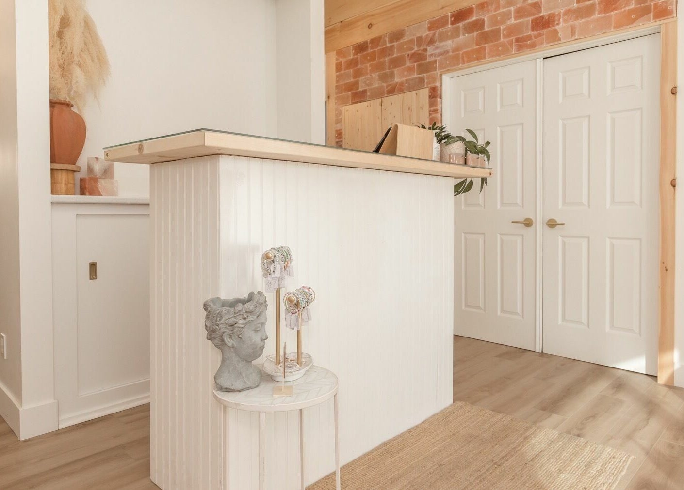 Reception area at Lifted Lash Lounge and Wellness Spa, Clinton, Ontario, CA. Elegant decor with a sophisticated touch.