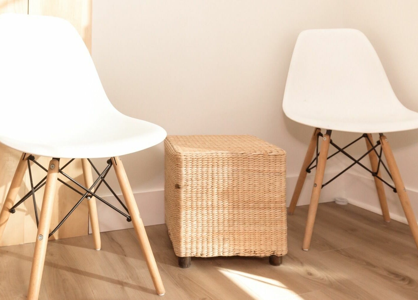 Modern lounge chairs with wicker table at Lifted Lash Lounge and Wellness Spa, Clinton, Ontario, CA.