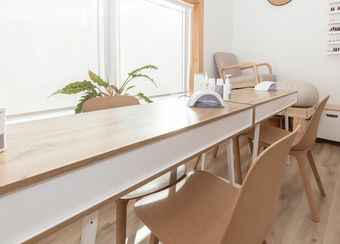 Bright nail station at Lifted Lash Lounge and Wellness Spa, Clinton, Ontario, CA. Clean and inviting decor.