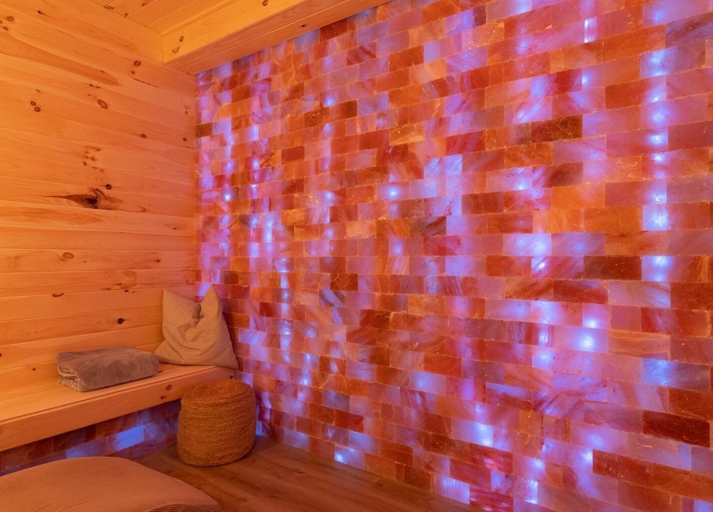 Warm, glowing salt room at Lifted Lash Lounge and Wellness Spa, Clinton, Ontario, CA, offering relaxation therapy.