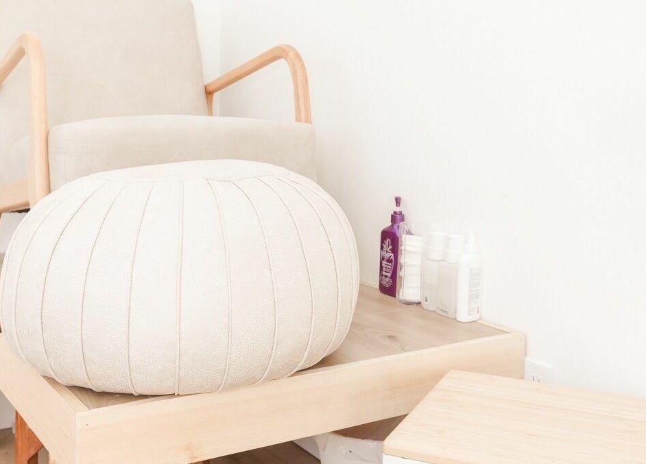 Relaxing treatment chair at Lifted Lash Lounge and Wellness Spa, Clinton, Ontario, CA, with soothing decor.