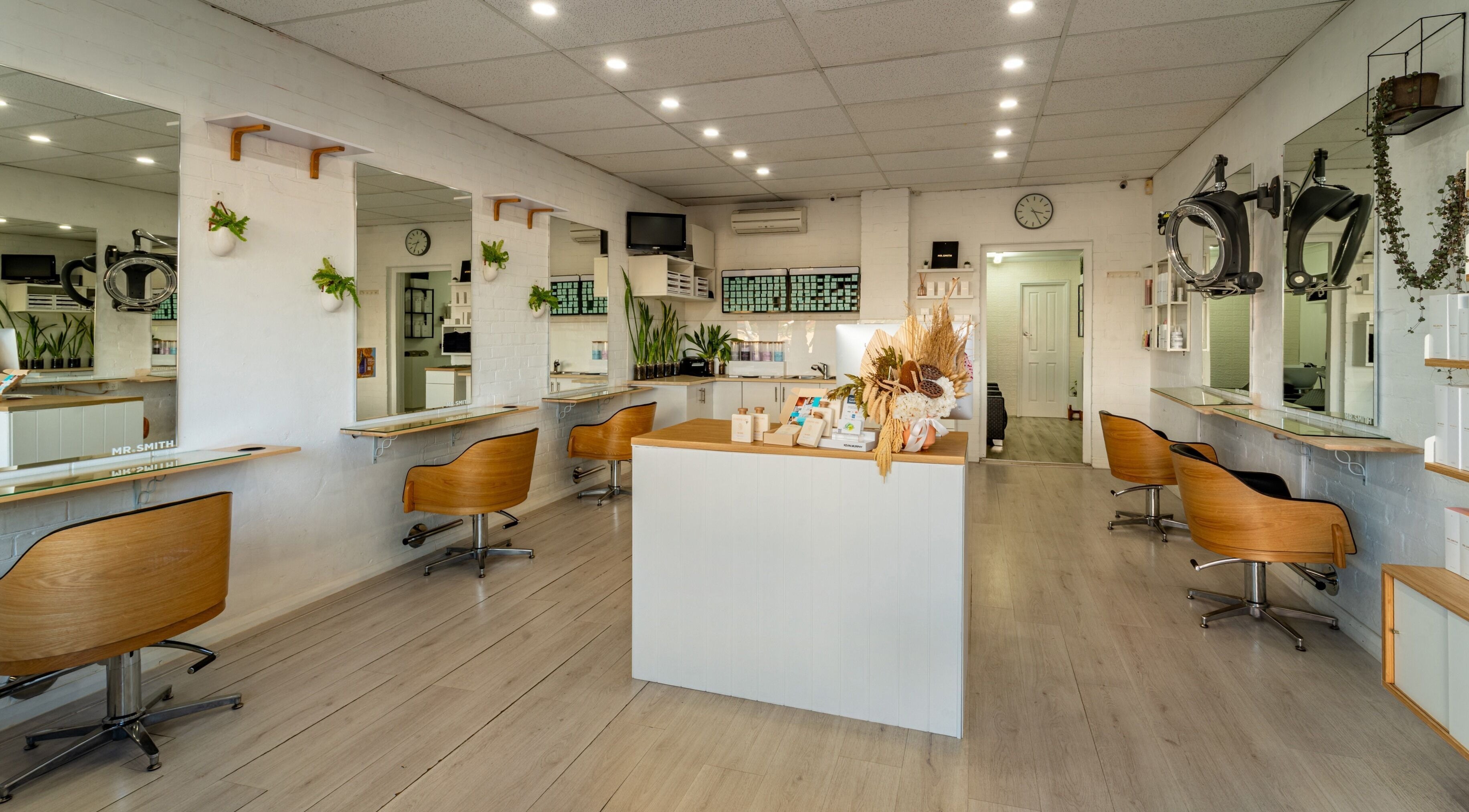 Interior of Solasta Hair Boutique in Scarborough, Western Australia, AU with stylish chairs and mirrors.