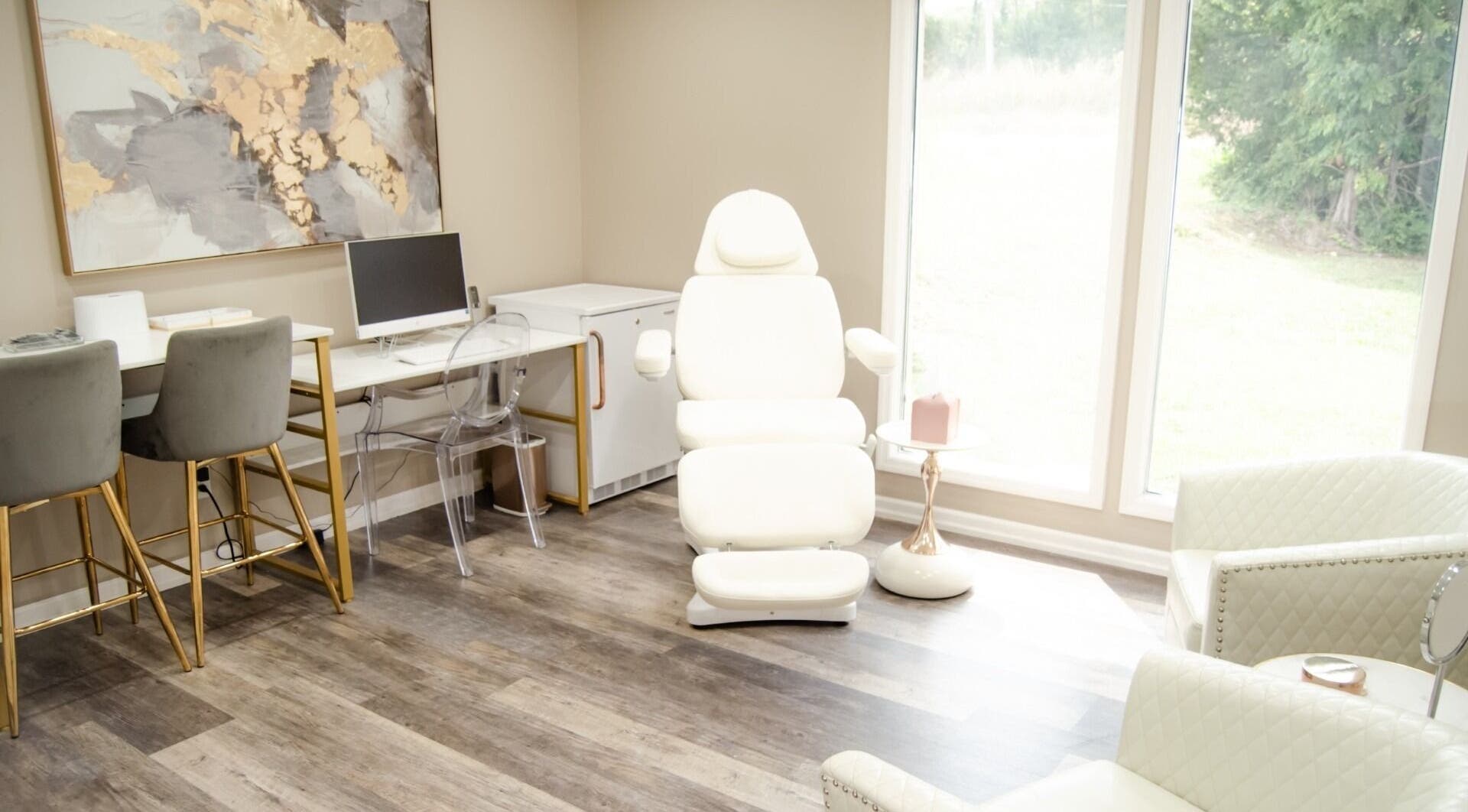 Elegant treatment room at Skin Logics Medi Spa in Dickson, Tennessee, US with modern decor and natural light.