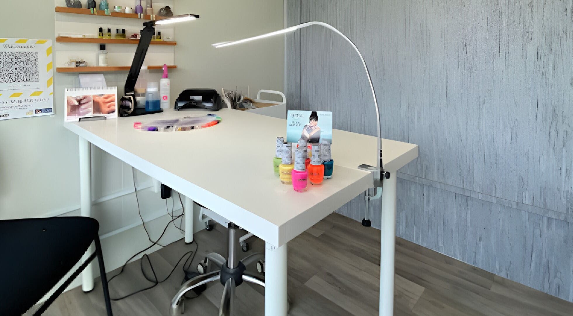 Bright modern nail station at Polish Me Pretty, Invercargill, Southland, NZ with colorful polish and sleek decor.