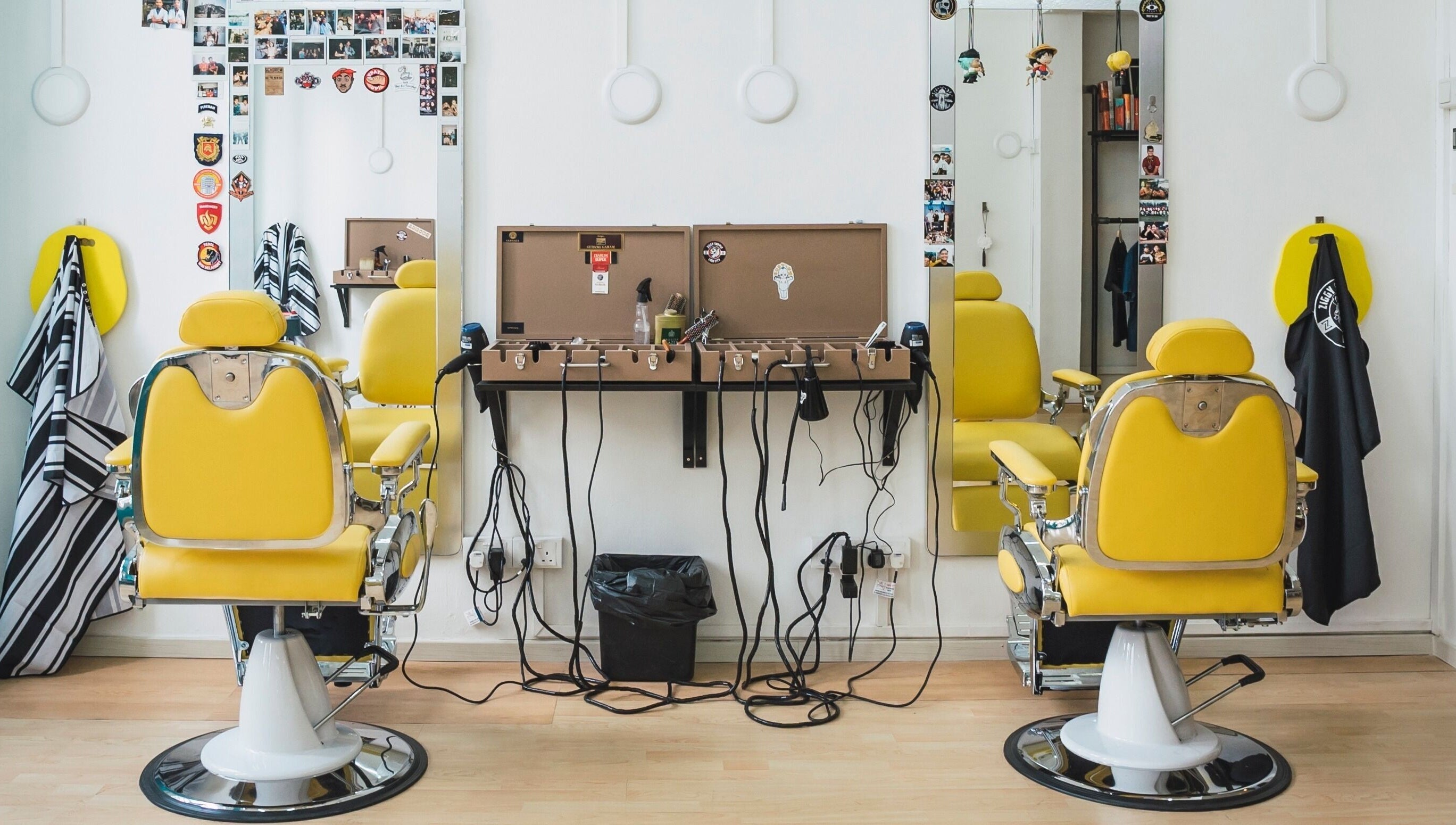 Bright yellow salon chairs at Bodeiga, Singapore, Singapore, SG, offering a vibrant beauty experience.