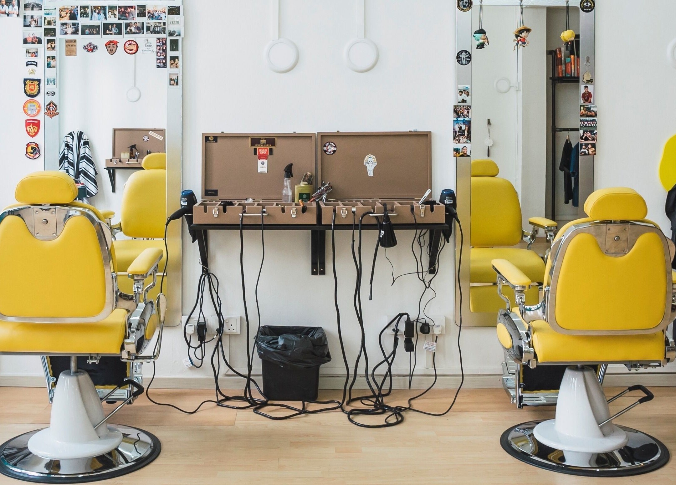 Bright yellow salon chairs at Bodeiga, Singapore, Singapore, SG, offering a vibrant beauty experience.