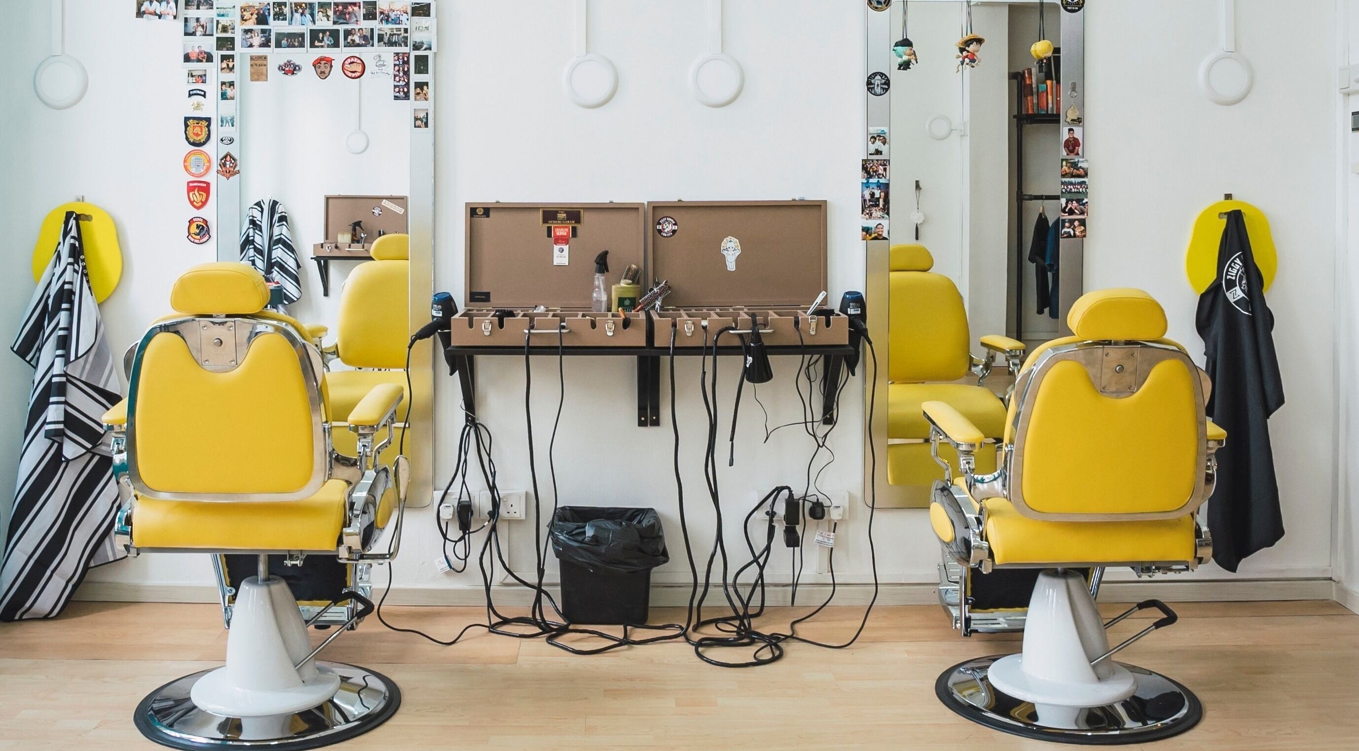 Bright yellow salon chairs at Bodeiga, Singapore, Singapore, SG, offering a vibrant beauty experience.