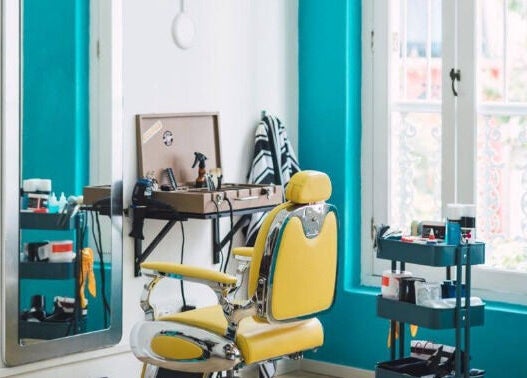 Stylish vintage salon chair and workspace at Bodeiga, Singapore, Singapore, SG blending classic and modern aesthetics.