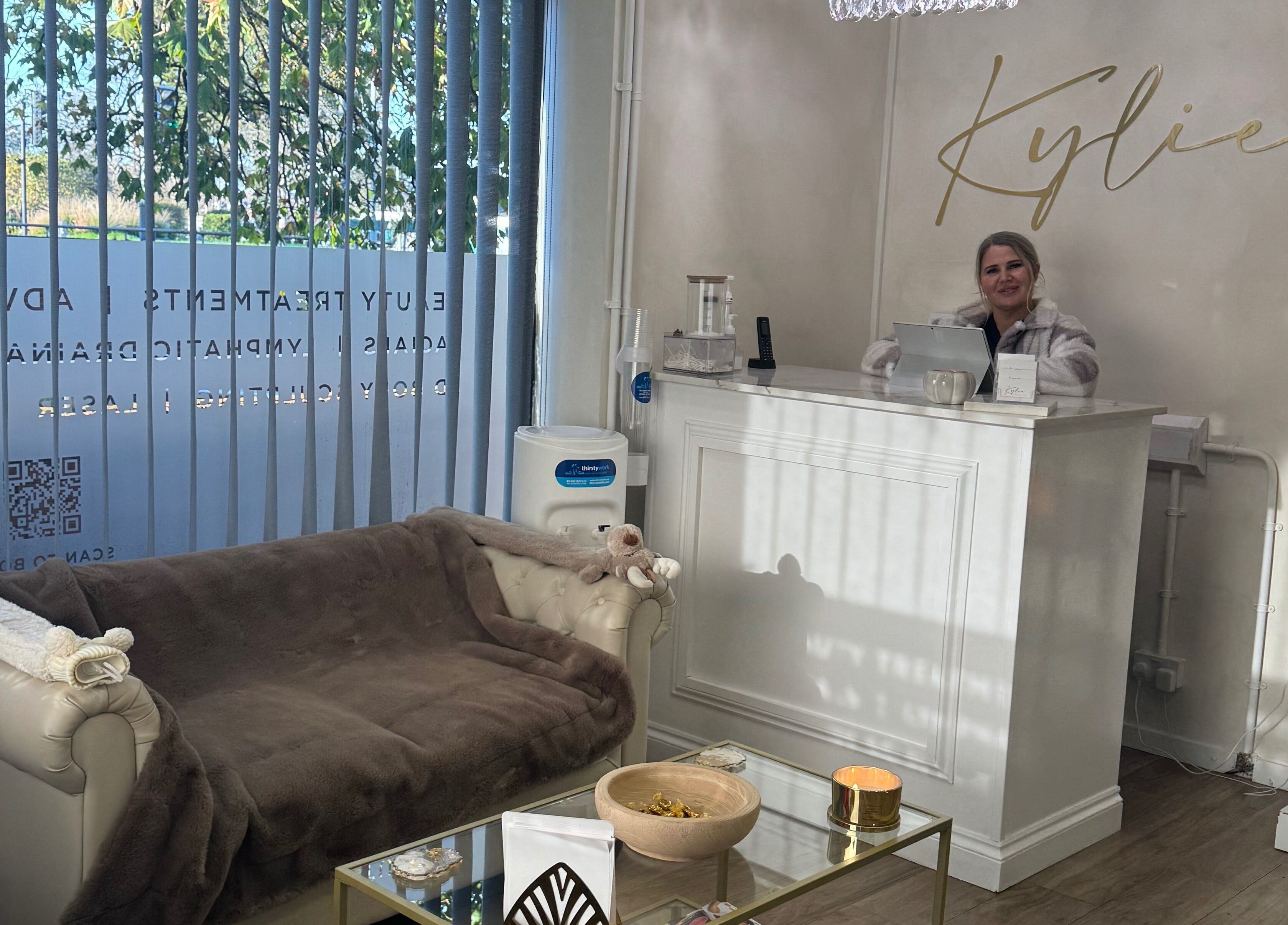 Welcoming reception at Kylie Aesthetics, Christchurch, GB with elegant decor and friendly staff.