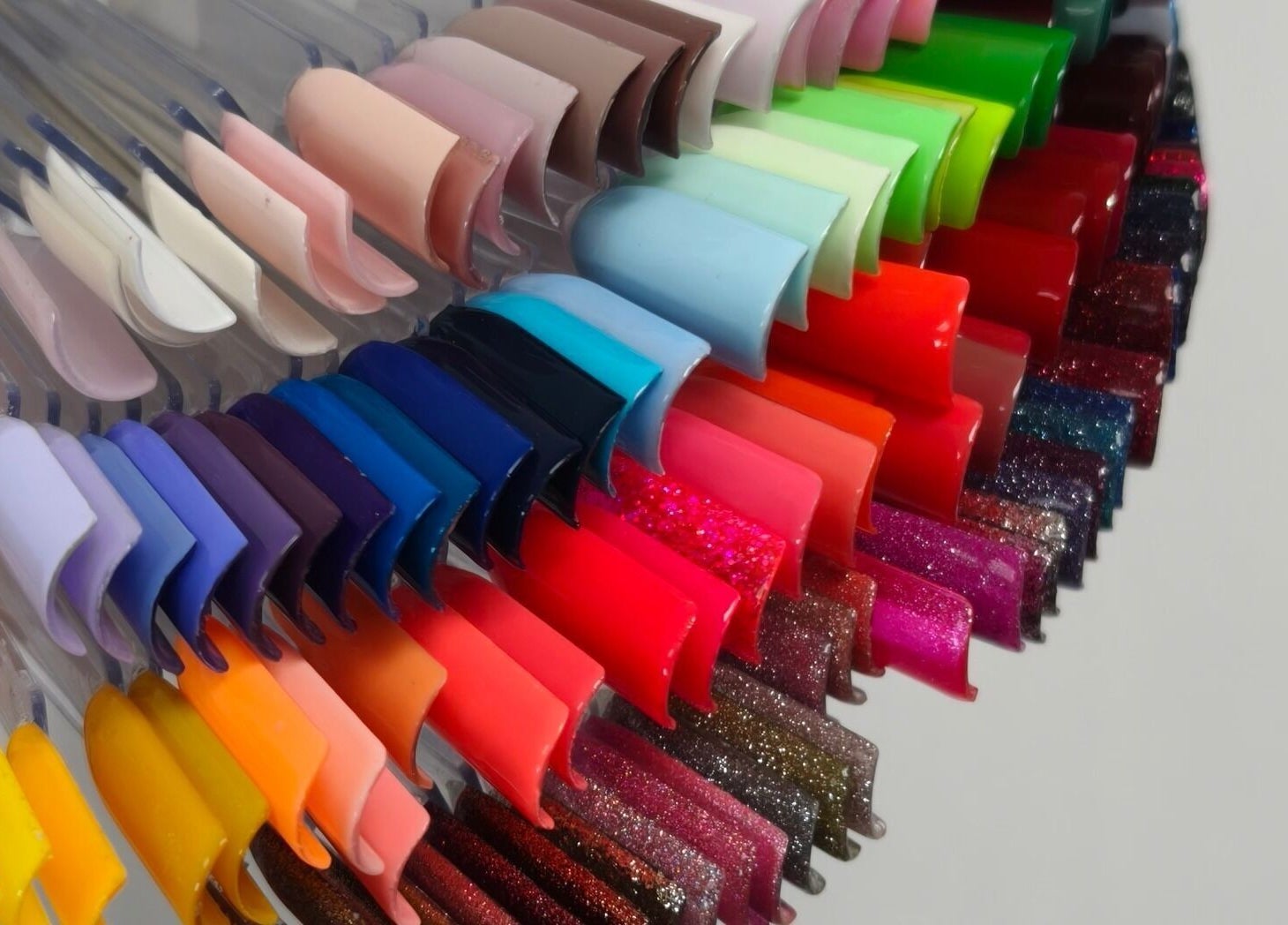 Colorful nail polish palette at Goddess Nail Studio, Auckland, Auckland, NZ, showcasing a range of vibrant hues.