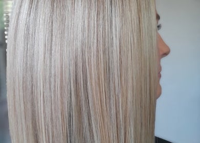 Blonde hair with smooth texture styled at Lelani Hair in Broome, Western Australia, AU.