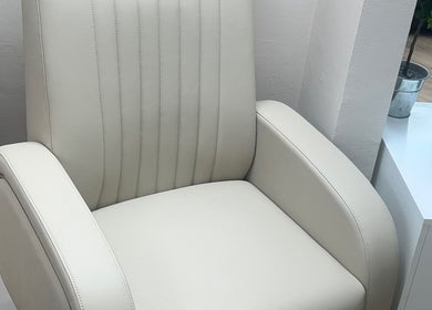 Comfortable salon chair at Auburn Hair & Beauty, Barnham, England, GB for relaxing beauty treatments.