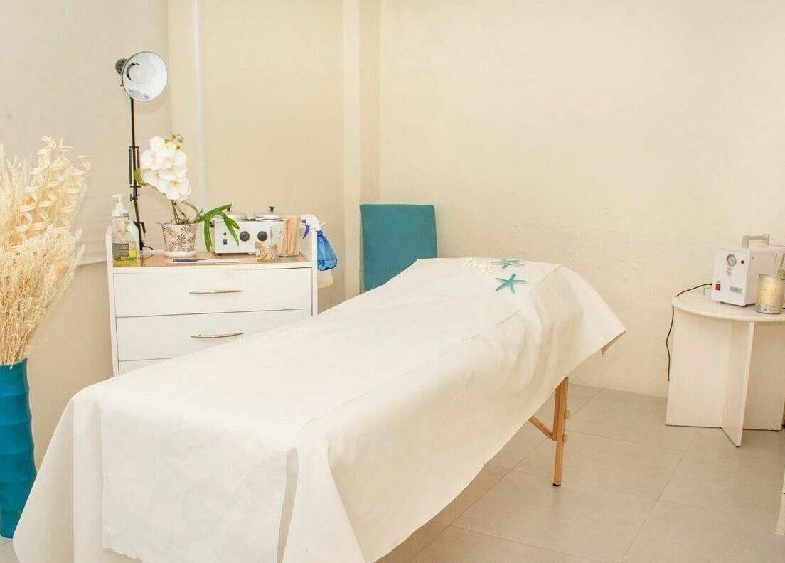 Relaxing treatment room at Ki West Spa, Bridgetown, Saint Michael, BB, featuring a tranquil massage table.