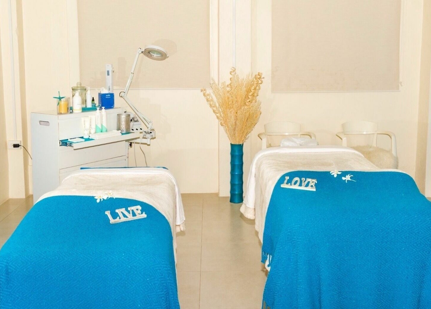 Serene spa treatment room with blue decor at Ki West Spa, Bridgetown, Saint Michael, BB.